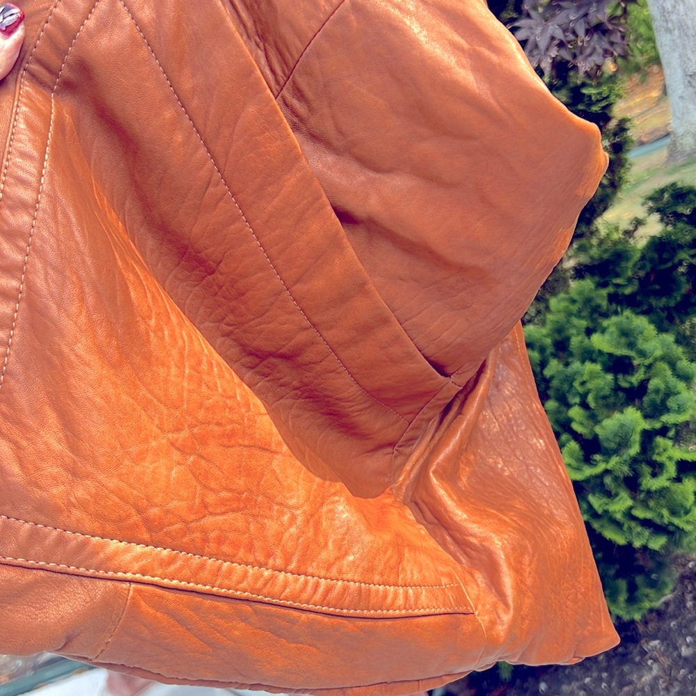 Handmade leather bag made out of a coat